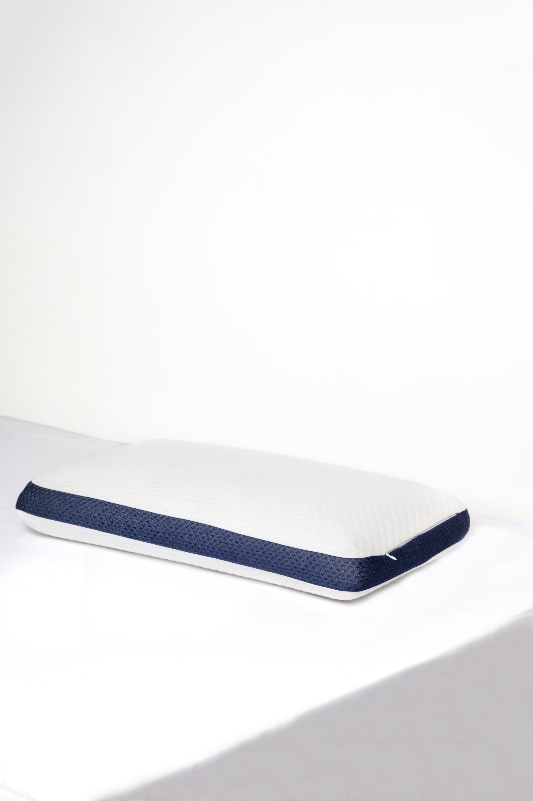 Bed pillow with navy gusset trim
