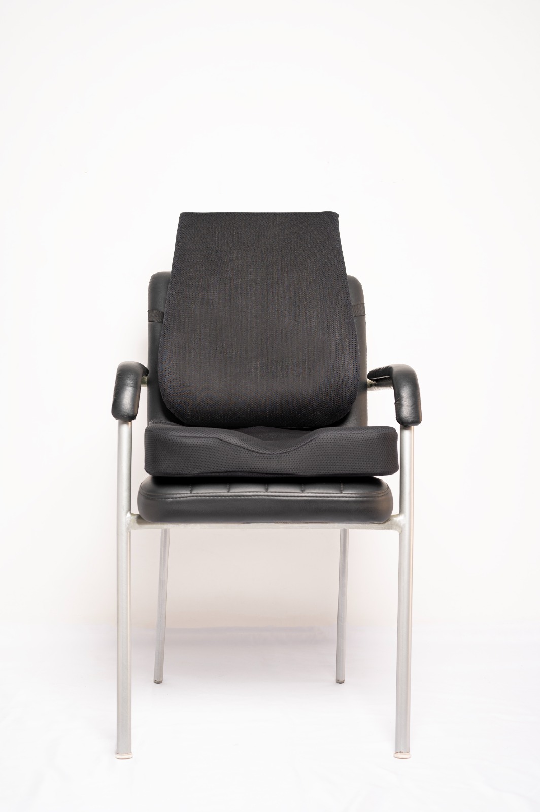 Office chair fitted with a lumbar back support and seat cushion